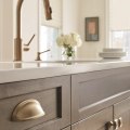 Does kitchen lighting have to match cabinet hardware?